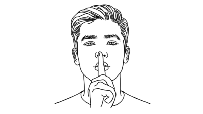 Man with finger over lips to shush